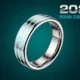 Chrome titanium smart ring with glowing health pulse line orbit on deep teal background.