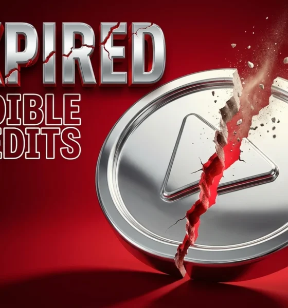 Cracked audio credit token symbolizing Audible class action over expiring audiobook credits.