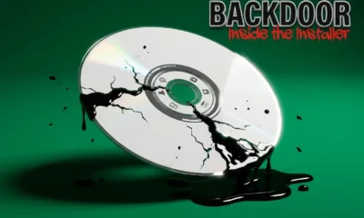 Cracked optical disc leaking black ink representing a hidden backdoor in a trusted software installer.