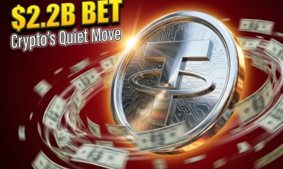 Glossy chrome stablecoin disk with swirling dollar banknotes against a deep crimson backdrop.