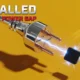 Industrial power plug suspended before connecting to an AI chip socket, Europe's stalled compute race.