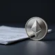 Macquarie reduces Bitcoin and Ether ETF holdings while building BitMine stake in Q1 2026.