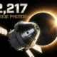 Orion spacecraft silhouette against lunar farside with solar eclipse corona during Artemis II flyby.