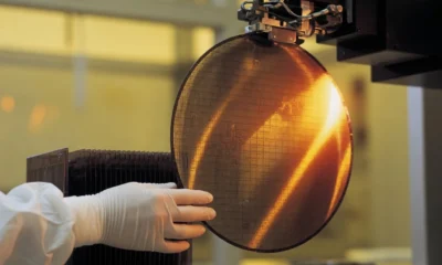 ASE Technology advanced packaging AI cleanroom wafer handling