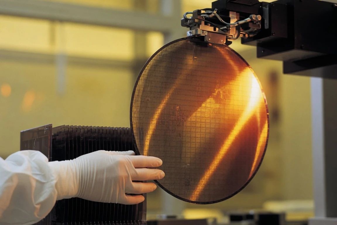 ASE Technology advanced packaging AI cleanroom wafer handling