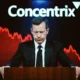 Concentrix CEO at earnings call podium with stock chart screen behind