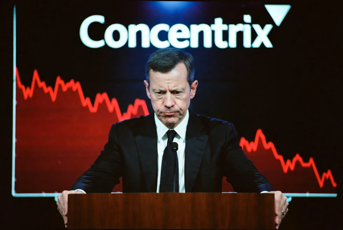 Concentrix CEO at earnings call podium with stock chart screen behind