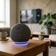 Google Home Speaker with Gemini light ring on wooden surface