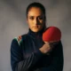 Manika Batra in India table tennis kit holding paddle
