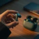 OnePlus Nord Buds 4 matte teal case and earbuds close-up
