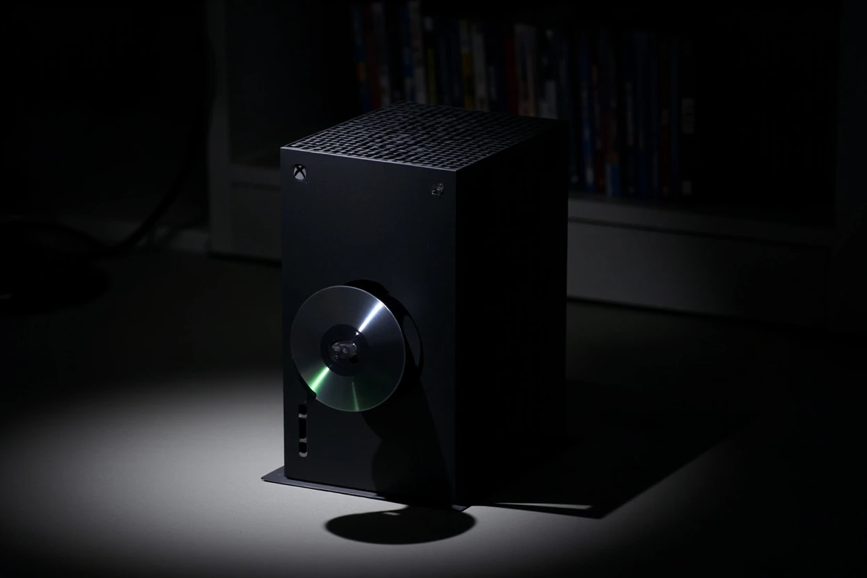 Xbox Positron disc-to-digital conversion Insider testing feature