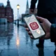 Amina app mandatory geolocation tracking Kyrgyz migrants Moscow