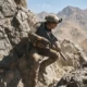 Crossfire adaptive cover system That's No Moon rocky terrain stance
